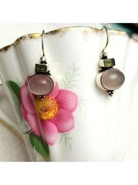 Silver hand made earrings about an inch .Not marked.